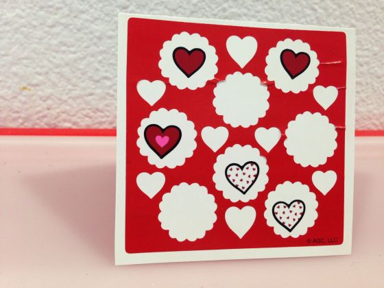 Happy Valentine's Day. Aditi Raychoudhury. 2014. Front. Sticker Sheet Backing, Left over Stickers, Elmer's Glue, Security Envelope, Sharpies.