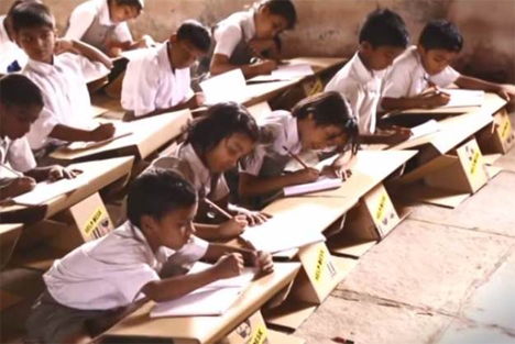 Desks made out of used cardboard boxes. Source: Dornob.com. Sponsored by Aarambh.com. 2014.